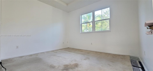975 NE 42nd Pl, Homestead, FL 33033 - spare room featuring carpet and baseboards