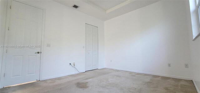 975 NE 42nd Pl, Homestead, FL 33033 - spare room featuring light colored carpet and baseboards