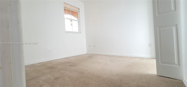 975 NE 42nd Pl, Homestead, FL 33033 - empty room featuring carpet flooring and baseboards