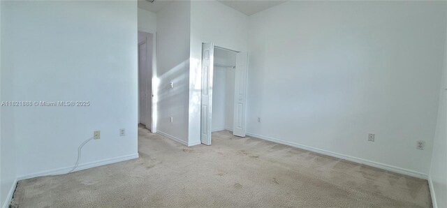 975 NE 42nd Pl, Homestead, FL 33033 - unfurnished bedroom with carpet flooring and a closet