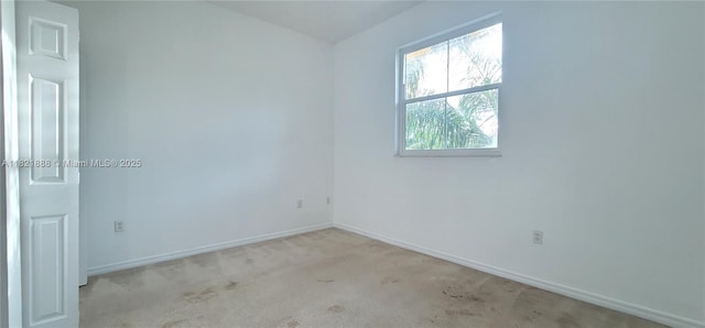 975 NE 42nd Pl, Homestead, FL 33033 - carpeted empty room with baseboards