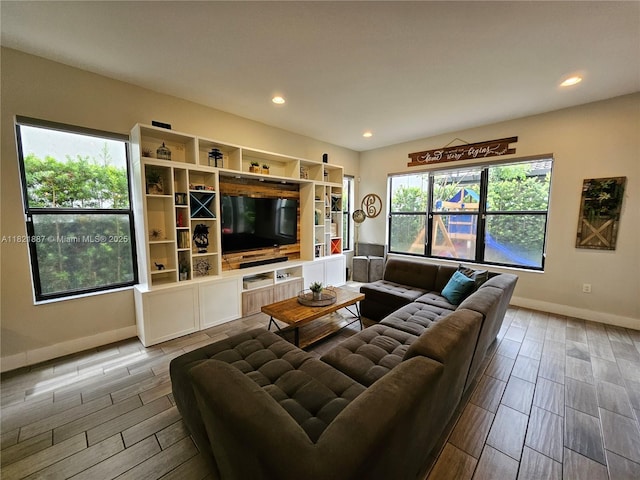 3238 W 96th Pl, Hialeah, FL 33018 - living room featuring wood finish floors and recessed lighting