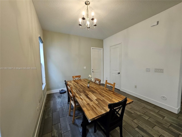 3238 W 96th Pl, Hialeah, FL 33018 - dining room with wood finish floors, a chandelier, and a textured ceiling