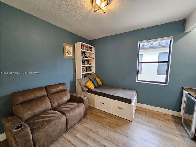 3238 W 96th Pl, Hialeah, FL 33018 - bedroom featuring light wood finished floors and a textured ceiling