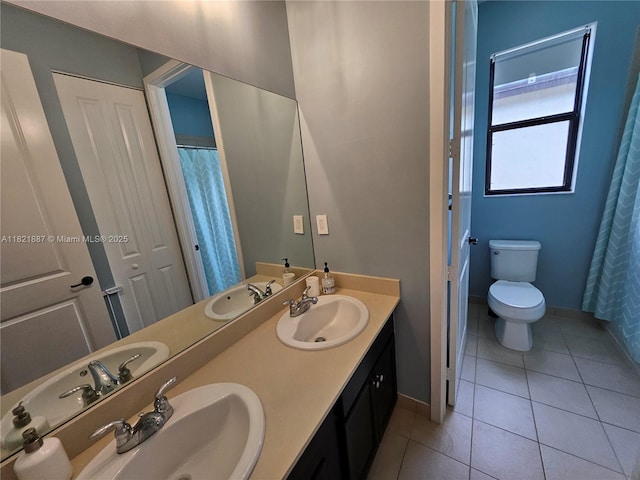 3238 W 96th Pl, Hialeah, FL 33018 - bathroom featuring double vanity and tile patterned floors