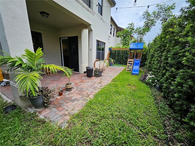 3238 W 96th Pl, Hialeah, FL 33018 - view of yard with a playground and a patio