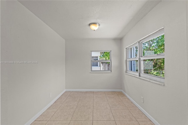 5288 N Andrews Ave, Oakland Park, FL 33309 - unfurnished room featuring light tile patterned floors and baseboards