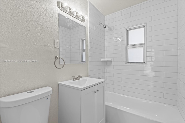 5288 N Andrews Ave, Oakland Park, FL 33309 - full bathroom with vanity, tub / shower combination, and a textured wall