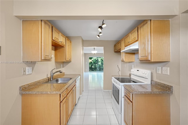 8305 NW 61st St Unit C305, Tamarac, FL 33321 - kitchen featuring white appliances, under cabinet range hood, light tile patterned flooring, track lighting, and light countertops