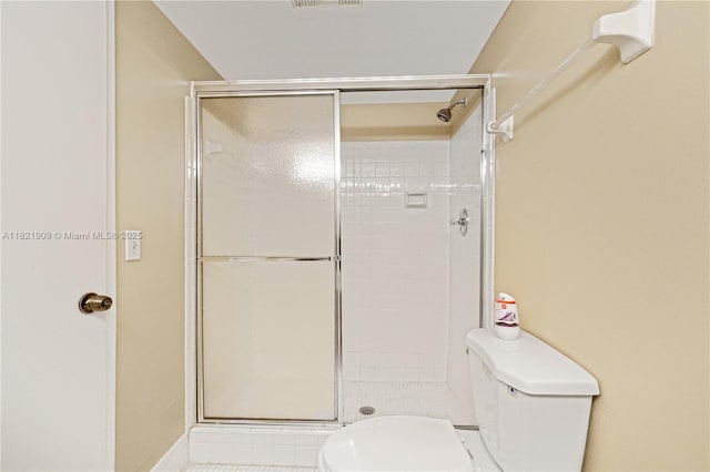 8305 NW 61st St Unit C305, Tamarac, FL 33321 - bathroom featuring toilet and a shower stall