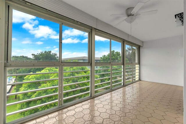 2504 Antigua Ter Unit L4, Coconut Creek, FL 33066 - unfurnished sunroom featuring ceiling fan