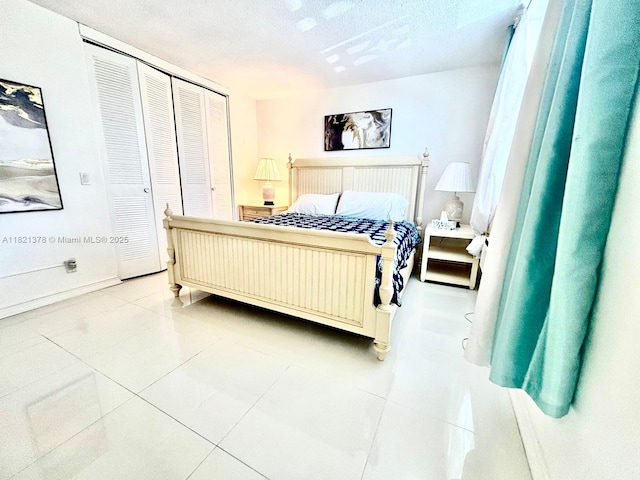 1936 S Ocean Dr Unit 7C, Hallandale Beach, FL 33009 - bedroom featuring light tile patterned floors and a closet