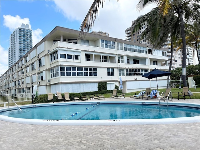 1936 S Ocean Dr Unit 7C, Hallandale Beach, FL 33009 - community pool with a patio area