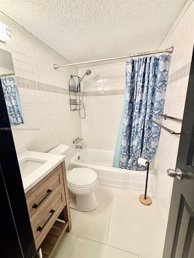 1936 S Ocean Dr Unit 7C, Hallandale Beach, FL 33009 - full bathroom with a textured ceiling, shower / bath combination with curtain, tile patterned floors, vanity, and tile walls