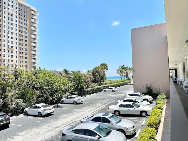 1936 S Ocean Dr Unit 7C, Hallandale Beach, FL 33009 - uncovered parking lot with a water view