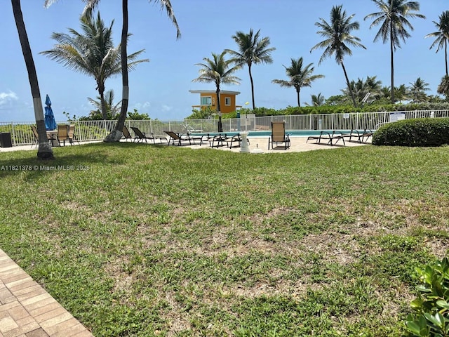 1936 S Ocean Dr Unit 7C, Hallandale Beach, FL 33009 - view of yard featuring a community pool