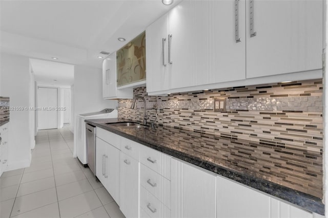 1901 Brickell Ave Unit B1508, Miami, FL 33129 - kitchen with light tile patterned flooring, white cabinetry, dishwasher, tasteful backsplash, and recessed lighting