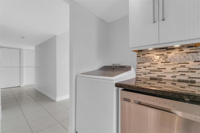 1901 Brickell Ave Unit B1508, Miami, FL 33129 - laundry room with light tile patterned flooring and baseboards