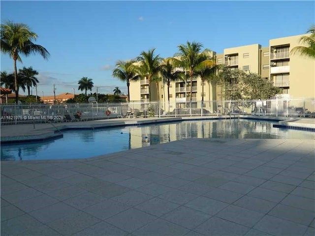 8185 NW 7th St Unit 316, Miami, FL 33126 - community pool featuring a patio area