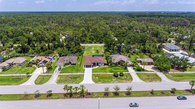 17010 Toledo Blade Blvd, Port Charlotte, FL 33954 - aerial perspective of suburban area featuring a heavily wooded area