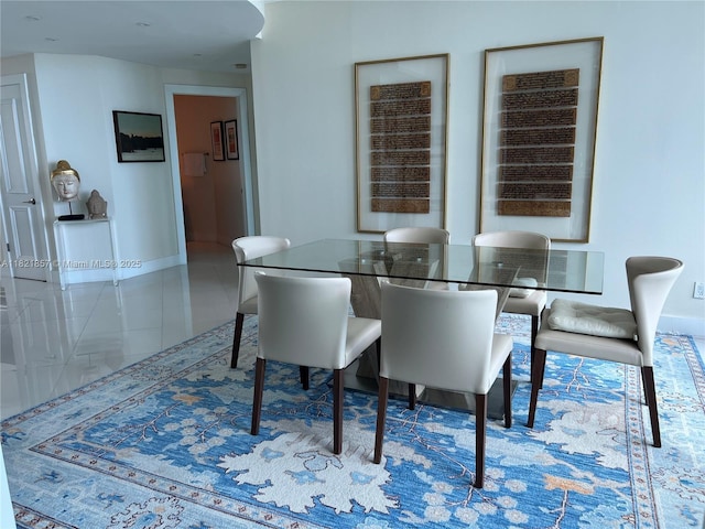300 S Pointe Dr Unit 1602, Miami Beach, FL 33139 - dining area featuring baseboards