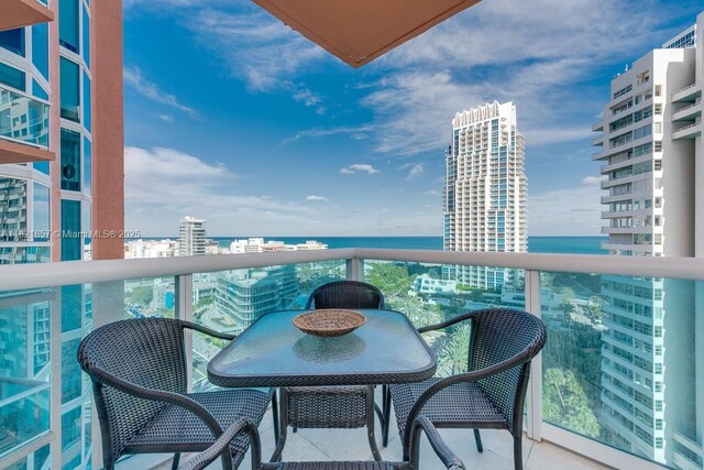 300 S Pointe Dr Unit 1602, Miami Beach, FL 33139 - balcony with a water view and a view of city