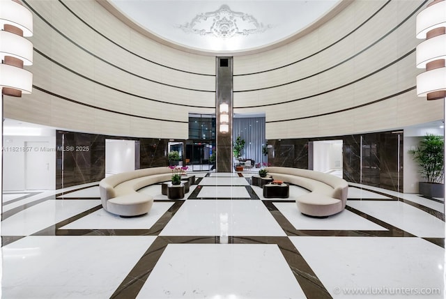 300 S Pointe Dr Unit 1602, Miami Beach, FL 33139 - building lobby with a high ceiling