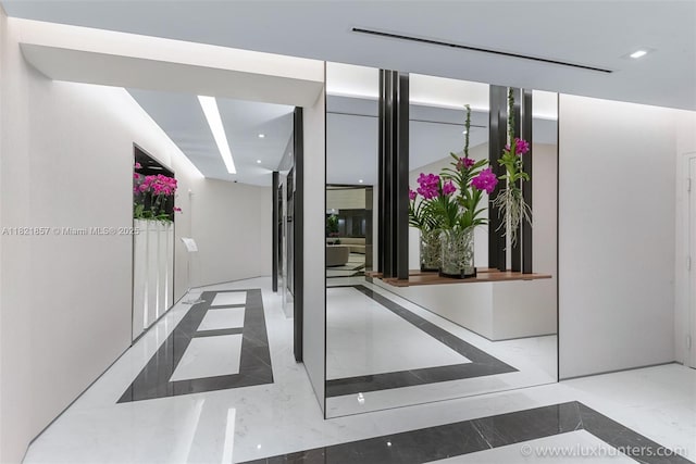 300 S Pointe Dr Unit 1602, Miami Beach, FL 33139 - interior space with recessed lighting, marble tiled flooring, and inlaid floor details
