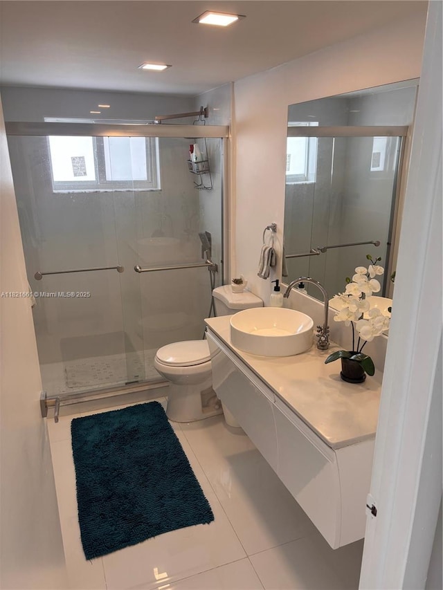 12923 SW 207th Ter, Miami, FL 33177 - full bathroom featuring a shower stall, vanity, healthy amount of natural light, and tile patterned floors