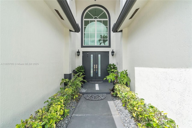 16132 SW 147th Ln, Miami, FL 33196 - doorway to property with stucco siding and french doors