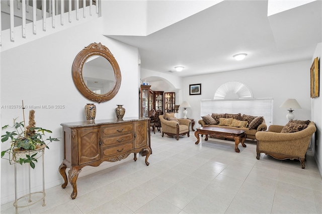 16132 SW 147th Ln, Miami, FL 33196 - living room featuring arched walkways and light tile patterned floors