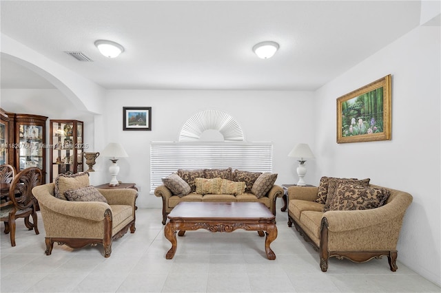 16132 SW 147th Ln, Miami, FL 33196 - living room with arched walkways and light tile patterned floors