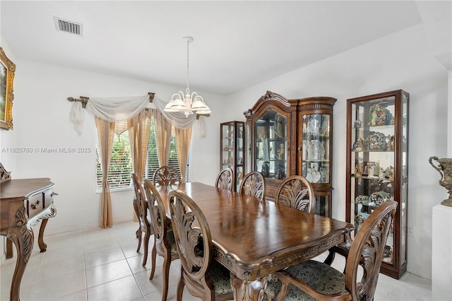 16132 SW 147th Ln, Miami, FL 33196 - dining room with a chandelier and light tile patterned flooring