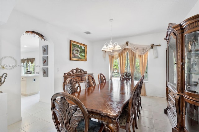 16132 SW 147th Ln, Miami, FL 33196 - dining space with a chandelier, light tile patterned floors, and plenty of natural light