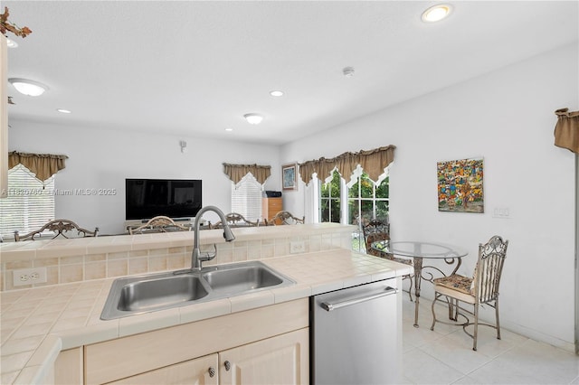 16132 SW 147th Ln, Miami, FL 33196 - kitchen featuring tile counters, stainless steel dishwasher, light tile patterned flooring, open floor plan, and recessed lighting