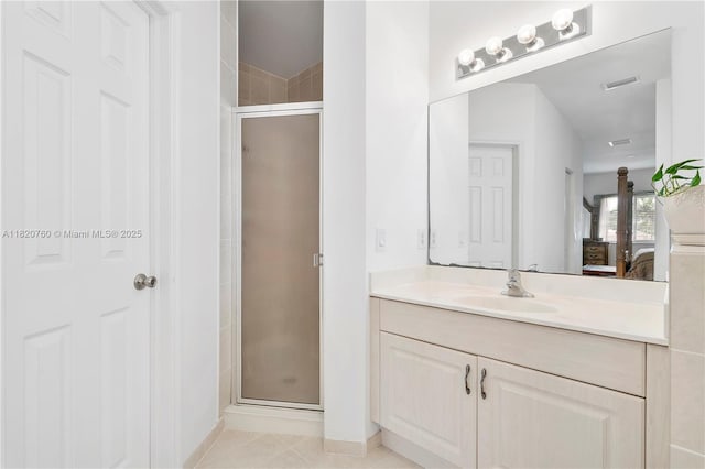 16132 SW 147th Ln, Miami, FL 33196 - bathroom featuring connected bathroom, a shower stall, vanity, and tile patterned floors