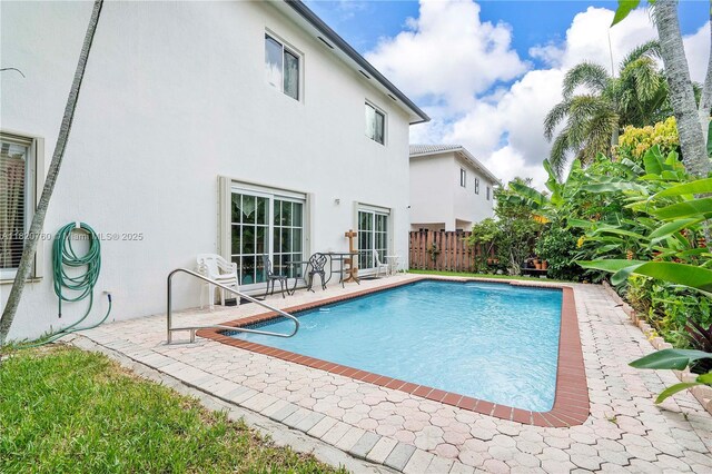 16132 SW 147th Ln, Miami, FL 33196 - view of swimming pool featuring a patio area