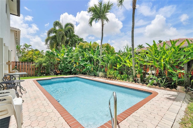 16132 SW 147th Ln, Miami, FL 33196 - view of swimming pool with a fenced backyard and a patio area