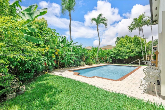 16132 SW 147th Ln, Miami, FL 33196 - view of swimming pool featuring a patio
