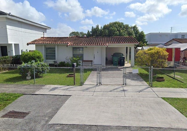 3731 SW 88th Pl, Miami, FL 33165 - mediterranean / spanish home with a tiled roof, stucco siding, a gate, and a fenced front yard