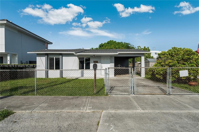 3731 SW 88th Pl, Miami, FL 33165 - view of front of house featuring a gate, a carport, a fenced front yard, stucco siding, and concrete driveway