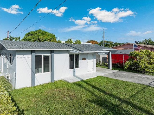 3731 SW 88th Pl, Miami, FL 33165 - rear view of property with stucco siding, concrete driveway, roof with shingles, and a carport