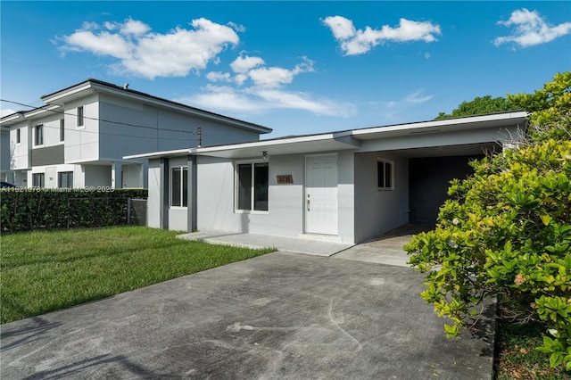 3731 SW 88th Pl, Miami, FL 33165 - view of front of home featuring stucco siding and a carport