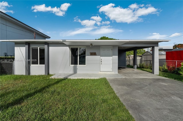 3731 SW 88th Pl, Miami, FL 33165 - view of front of property with driveway, a carport, and stucco siding