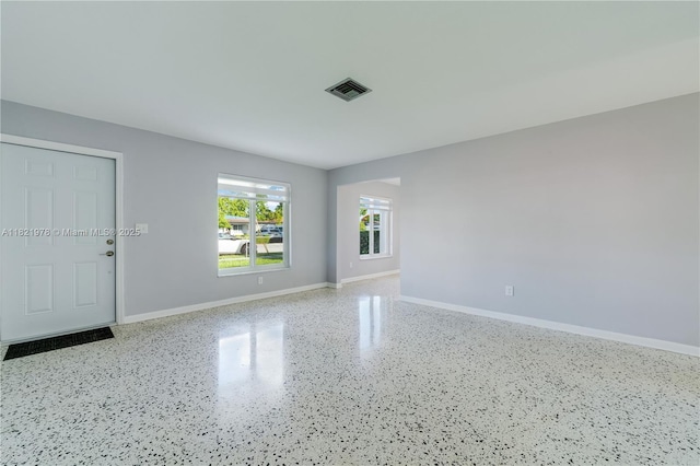 3731 SW 88th Pl, Miami, FL 33165 - unfurnished room featuring baseboards and speckle patterned floor