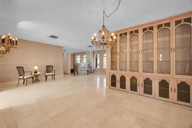 5025 SW 90th Ct, Miami, FL 33165 - hall featuring a chandelier and baseboards