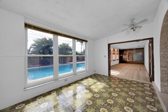 5025 SW 90th Ct, Miami, FL 33165 - unfurnished room with vaulted ceiling and ceiling fan
