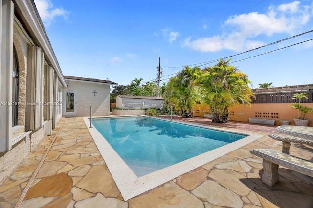 5025 SW 90th Ct, Miami, FL 33165 - outdoor pool with a patio and a fenced backyard