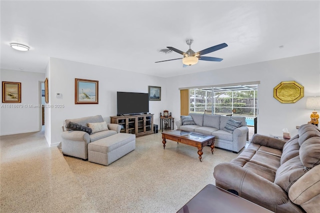 6736 Orchid Dr, Miami Lakes, FL 33014 - living room with ceiling fan and speckled floor