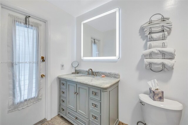6736 Orchid Dr, Miami Lakes, FL 33014 - bathroom featuring vanity and speckled floor